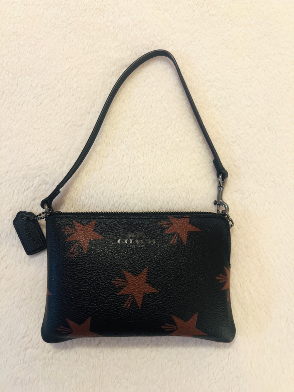 🩷 COACH WRISTLET STAR
CANYON PRINT💚